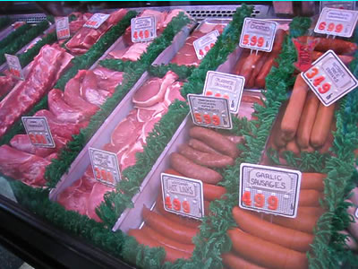 meat in a butcher case meat in a butcher case